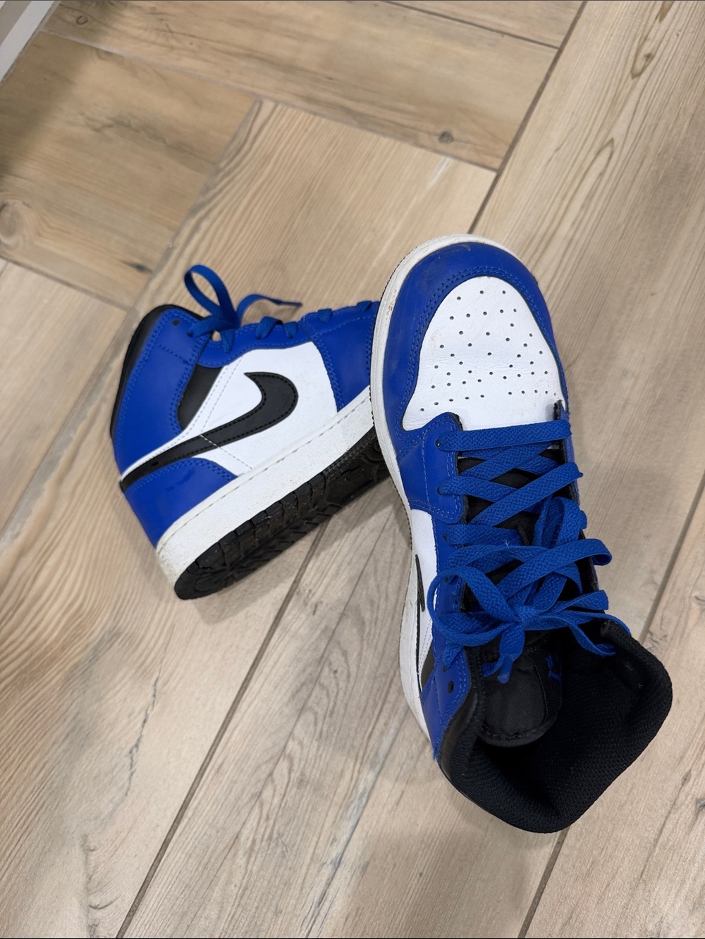 Nike Jordan Blue and White High-Top Sneakers with Black Swoosh